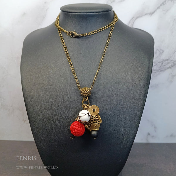 bronze cinnabar asian charm necklace