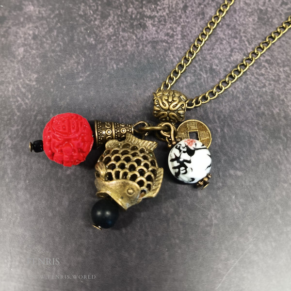 bronze cinnabar asian charm necklace