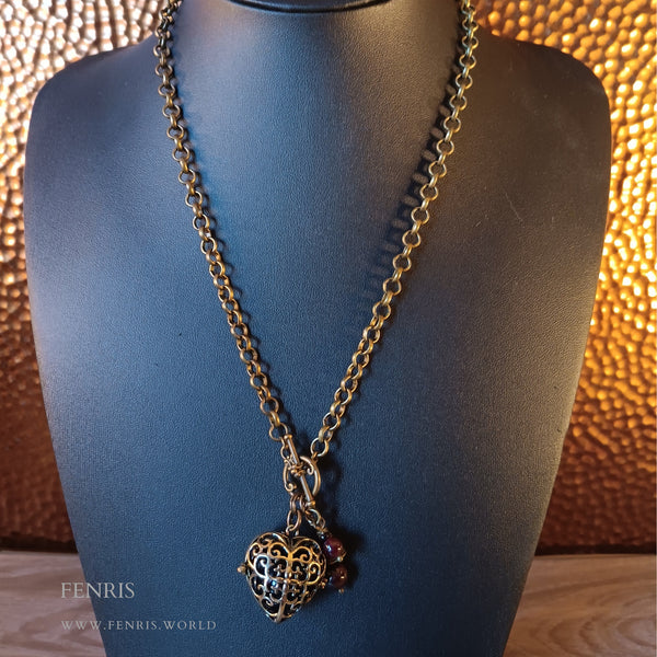 bronze heart locket necklace black agate sphere garnet charms