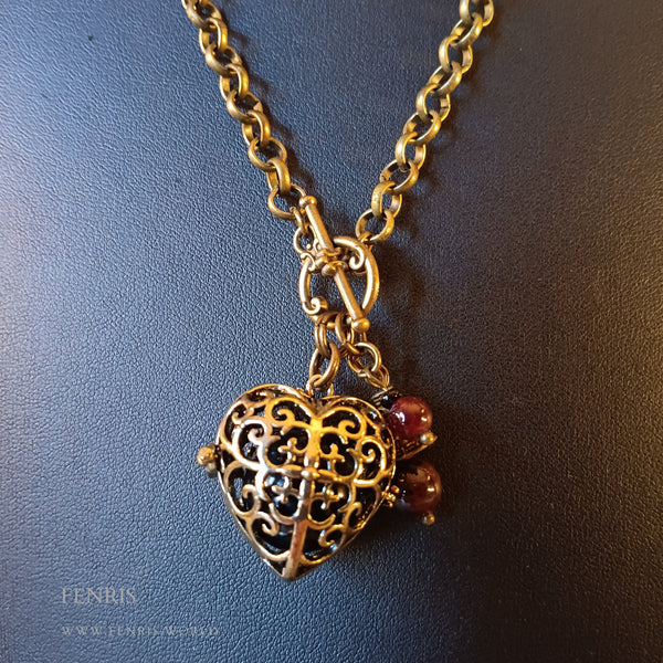 bronze heart locket necklace black agate sphere garnet charms
